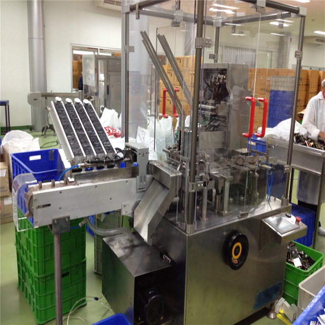 3 atau 4 buah mesin cartoning kondom