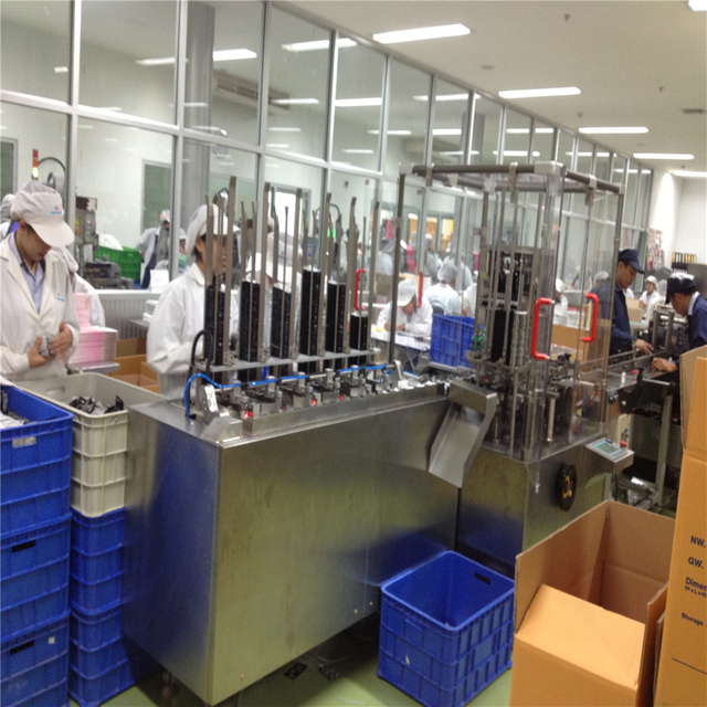 12 buah mesin cartoning kondom