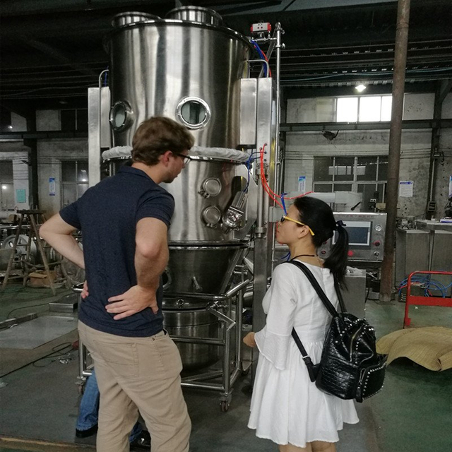 Pengujian pelanggan Brasil dan pengecekan super mixer & pelletizer yang dia beli